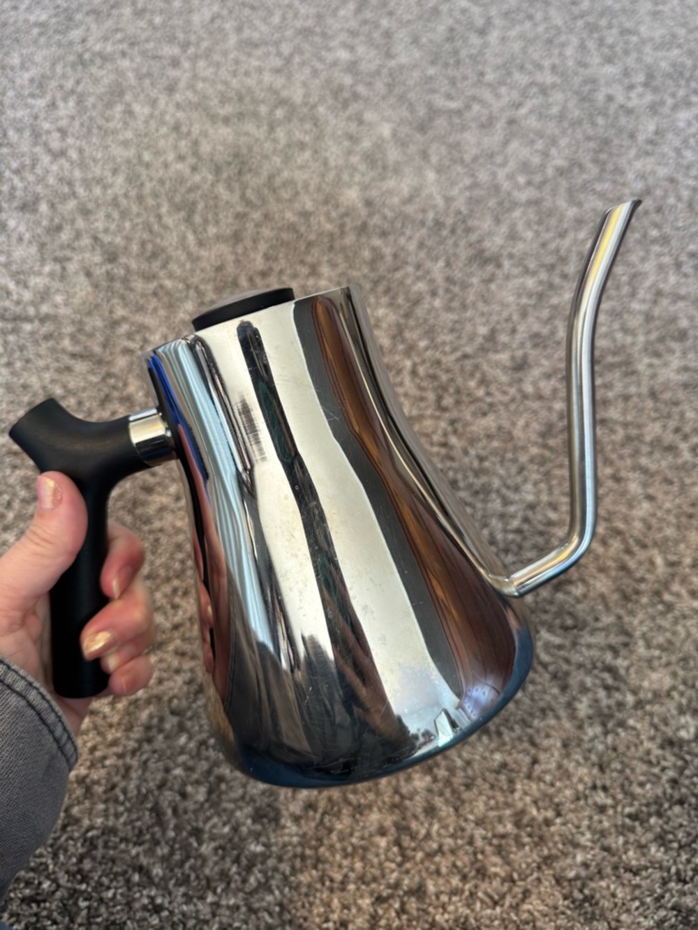 Fellow Stainless Steel Gooseneck Kettle with Black Handle stovetop